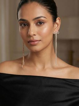 Niscka - White Ad Stones Gold Plated Bow Design Long Earrings