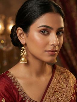 Niscka - White Pearls Matte Gold Plated Long Petal Jhumka Earrings