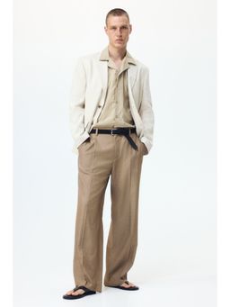 H&M - Men Beige Loose Fit Tailored Trousers