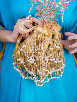 A Clutch Story - Gold Fringe Glam Potli