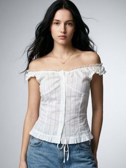 Outzidr - White Off Shoulder Ruffle Hem Shirt