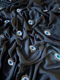 Ensembles - Black Evil Eye Saree With Unstitched Blouse