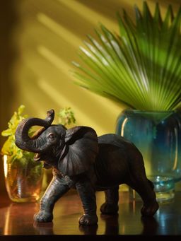 Pure Home + Living - Copper Polyresin Walking Elephant