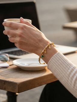 Yellow Chimes - Women Gold Plated Green Stone Charm Bracelet