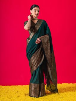 Triyah - Intricate Green Big Border Muga Silk Saree With Unstitched Blouse Fabric