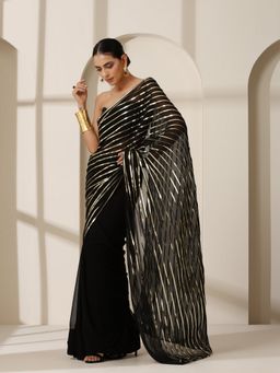 Swtantra - Black And Gold Impression Georgette Saree with Unstitched Blouse