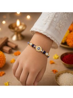 SHILLYN - Protective Evil Eye Gold-Plated Floral Rakhi In Navy Blue and White