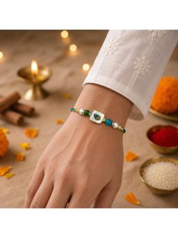 SHILLYN - Premium Gold-Plated Peacock Feather (Mor Pankh) Pearl Rakhi