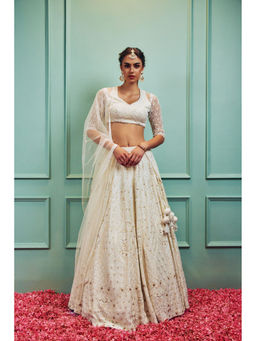 SAMMOHI BY MOKSHA & HIRAL - Ivory Embroidered Lehenga With Stitched Blouse And Dupatta (Set of 3)