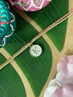 Digital Dress Room - K Letter White Initial Coin Pendant Thread Rakhi