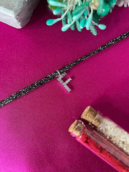 Digital Dress Room - F Letter Silver Plated AD Initial Black Thread Rakhi with Roli Chawal
