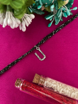 Digital Dress Room - U Letter Silver Plated AD Initial Black Thread Rakhi with Roli Chawal