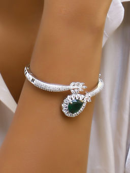 Adwitiya - Rhodium Plated Cz White and Green Emerald Stone Studded Leaf Design Bracelet