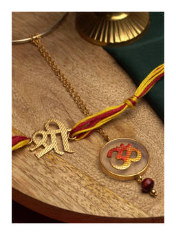 Suhani Pittie - 22K Gold Plated Shri Rakhi With Red & Yellow Tieups & Hand Painted Om Lumba Rakhi Set