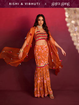 Gajra Gang - Rishi Vibhuti 2.0 Orange Crepe Shell embellished Cape Bustier Sharara (Set of 3)