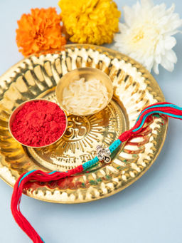 Niscka - Bless Your Brother with This Silver Ganesha Rakhi with Roli Chawal