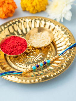 Niscka - Elegant Blue Beaded Rakhi with Roli Chawal