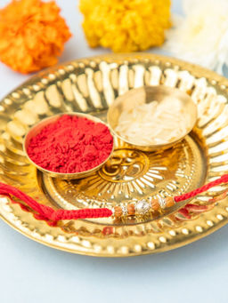Niscka - Red Sacred Silver Om Rakhi with Roli Chawal