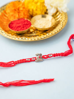 Niscka - Red Thread & Silver Beads Divine Shivling Rakhi with Roli Chawal