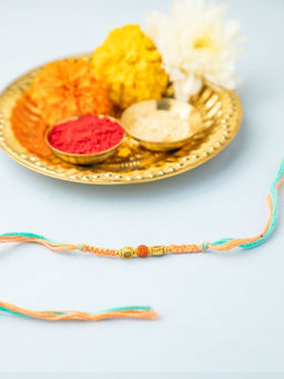 Niscka - Multi-Color Thread & Golden Beads Rudraksha Rakhi with Roli Chawal