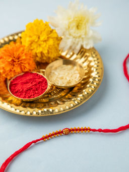 Niscka - Red Soothing Chandan Beads Rakhi with Roli Chawal