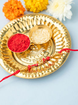 Niscka - Red Thread & Beads Radiant Golden Om Rakhi with Roli Chawal