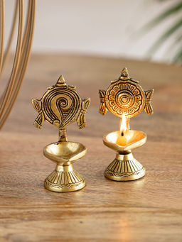 ExclusiveLane - Hand Carved Shankh & Chakra Balaji Brass Diyas