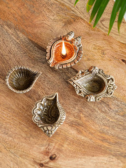 ExclusiveLane - Laxmi-Ganesh Shankh Pushp Hand Carved Brass Diyas