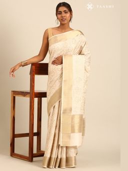 Taashi - the ivory self brocade White Saree