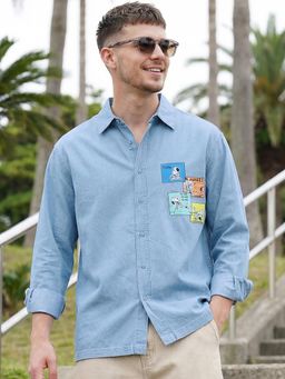 Bewakoof - Official Peanuts Men's Blue Den Graphic Printed Oversized Shirt