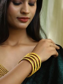 Adwitiya - Women Gold Plated Stone Studded Printed Yellow Lac Bangles (Set of 4)