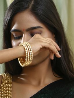Adwitiya - Women Gold Plated Stone Studded Bangles (Set of 4)