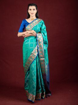 EXCLUSIVA - Green Banarasi Blended Silk Woven Saree Zari Work with Unstitched Blouse