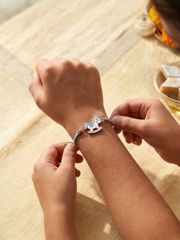 TOUCH925 - 925 Silver Rocking Horse Kids Rakhi for Sibling with Enamel Charm and Blue Cord