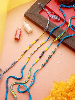 Aatmana - Multicolored Pearl Beaded Thread Rakhi with Roli Chawal