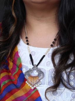 BeAbhika - Dangling Paan Pearly Pendant Necklace