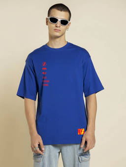 Bewakoof - Official DC Men's Blue Past Present Future Graphic Printed Oversized T-shirt
