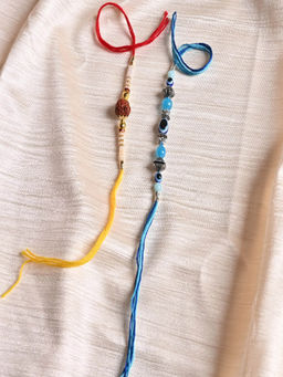 JEWELZ - Evil Eye and Rudraksh Rakhi Combo (Set of 2)
