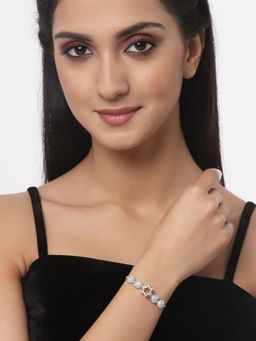 ZENEME - Silver Rhodium Plated American Diamond Studded Star Shaped Adjustable Bracelet