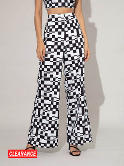 Twenty Dresses by Nykaa Fashion - Black And White Geometric Printed Wide Legged Pants