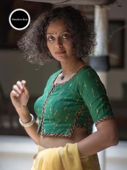 Suta - Green Round Stitched Blouse