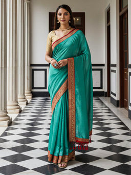 Akhilam - Women Teal Silk Blend Solid Saree with Unstitched Blouse