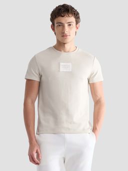 U.S. POLO ASSN. - Men Beige Cotton Solid/Plain T-Shirt