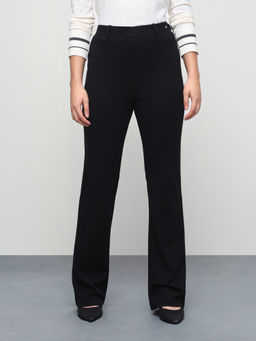 U.S. POLO ASSN. - Black Women Solid Flared Fit Trousers