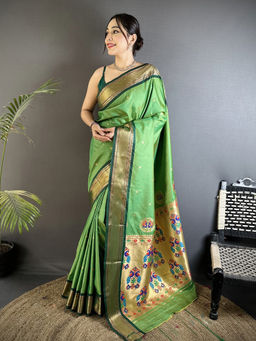 Elora - Women Green Silk Blend Woven Saree with Unstitched Blouse