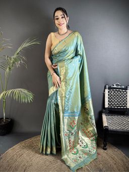 Elora - Women Green Silk Blend Woven Saree with Unstitched Blouse