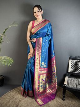 Elora - Women Blue Silk Blend Woven Saree with Unstitched Blouse