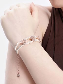 Estele - Stylish Pearl Bracelet enhanced with Elegant Rose Gold Flower Motifs