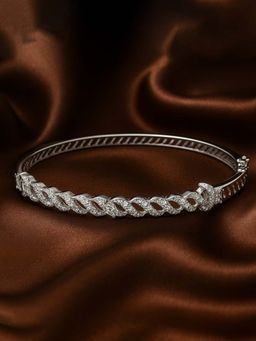 Estele - Sparkling CZ Twist Design Bracelet in Rhodium Finish | Party & Sangeet Wear