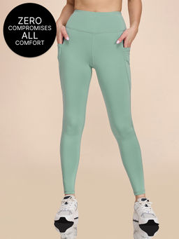 Kica - High-Waisted Workout Leggings in Sculpting Stretch Kica SKN Fabric Green